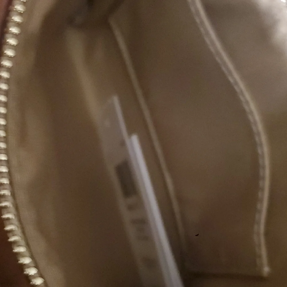 Coach Embossed Cream Wristlet - Picture 4 of 5